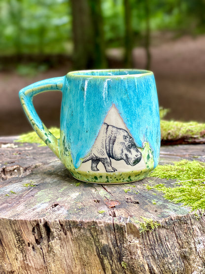 Green mug with hippopotamus