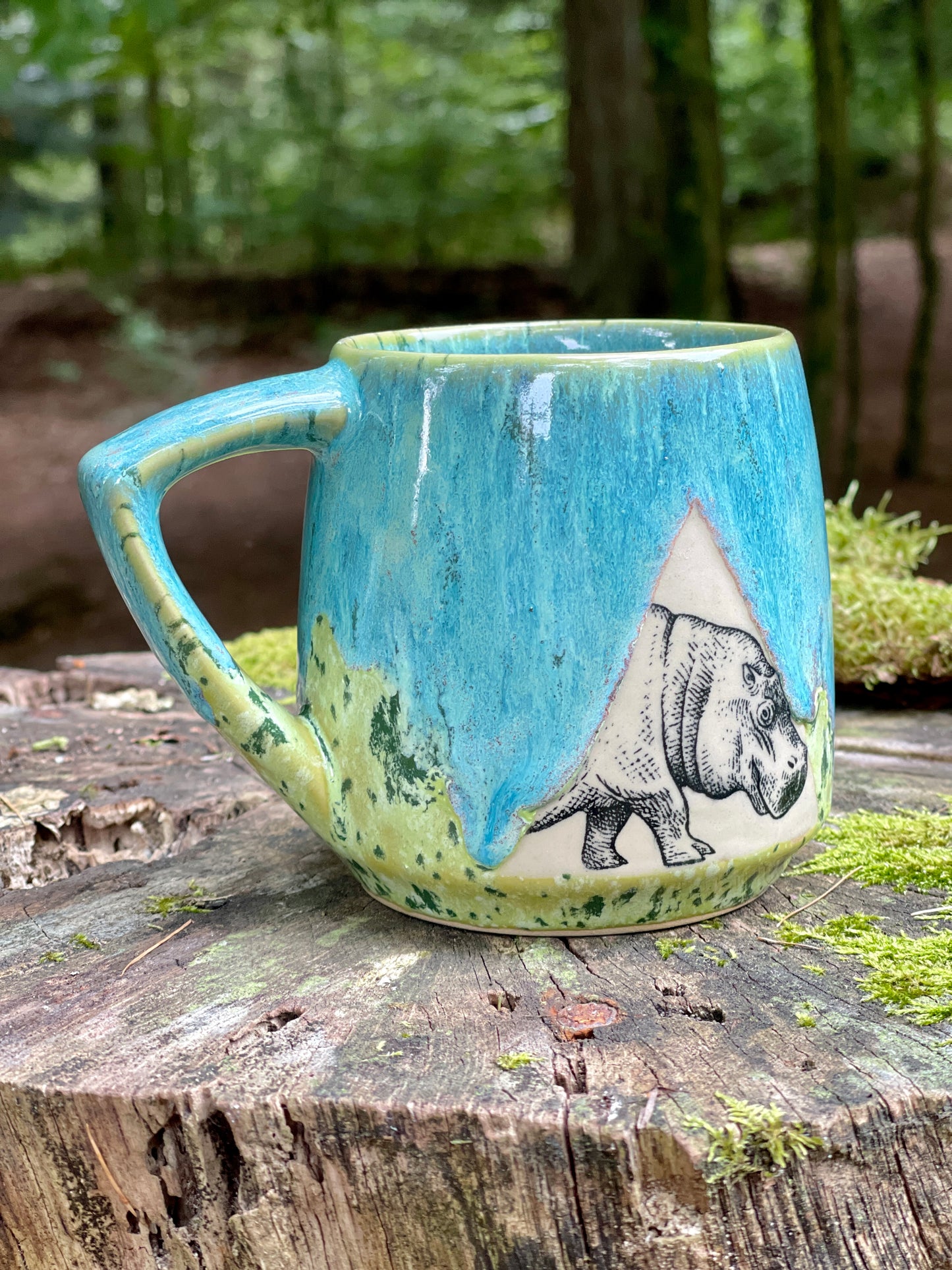 Green mug with hippopotamus